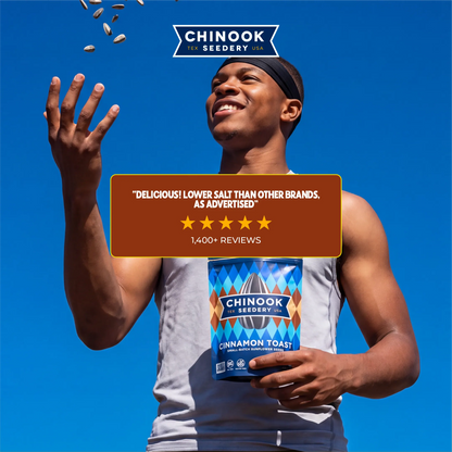 Customer tossing sunflower seeds while holding a 4 oz bag of Cinnamon Toast sunflower seeds, with a five-star review