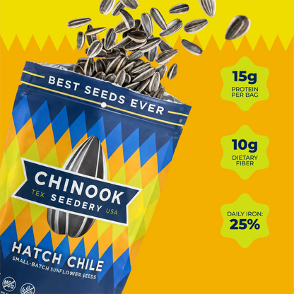 Open 4 oz bag of Hatch Chile sunflower seeds with seeds spilling out