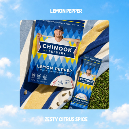 Lemon Pepper sunflower seeds in 4 oz and 1.5 oz bags on a striped beach towel