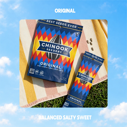 Original sunflower seeds in 4 oz and 1.5 oz bags on a striped beach towel