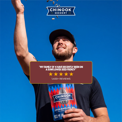 Customer tossing sunflower seeds while holding a 4 oz bag of Smokehouse BBQ sunflower seeds, with a five-star review